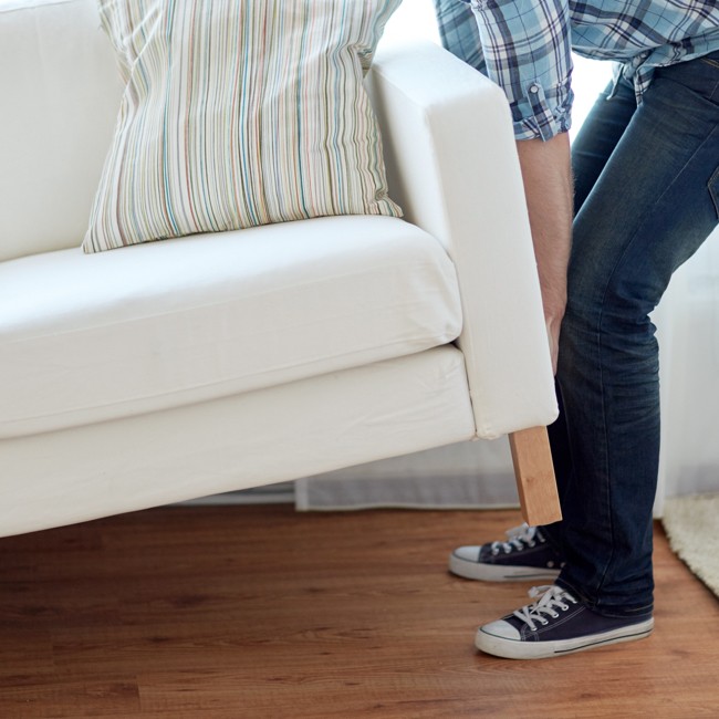 moving furniture preparing for installation | Ambassador Flooring