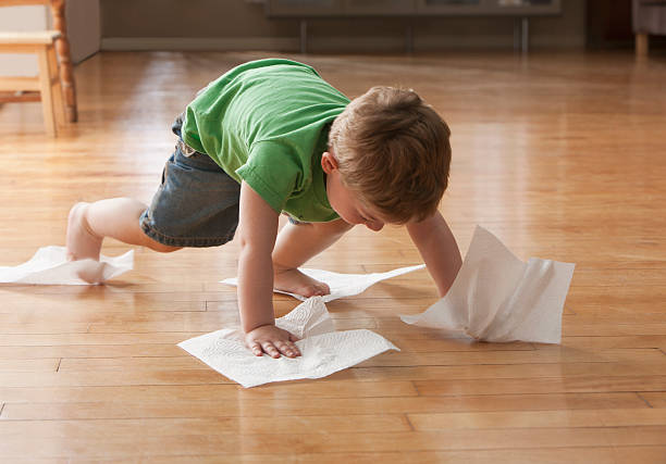 Kid cleaning Floor | Ambassador Flooring