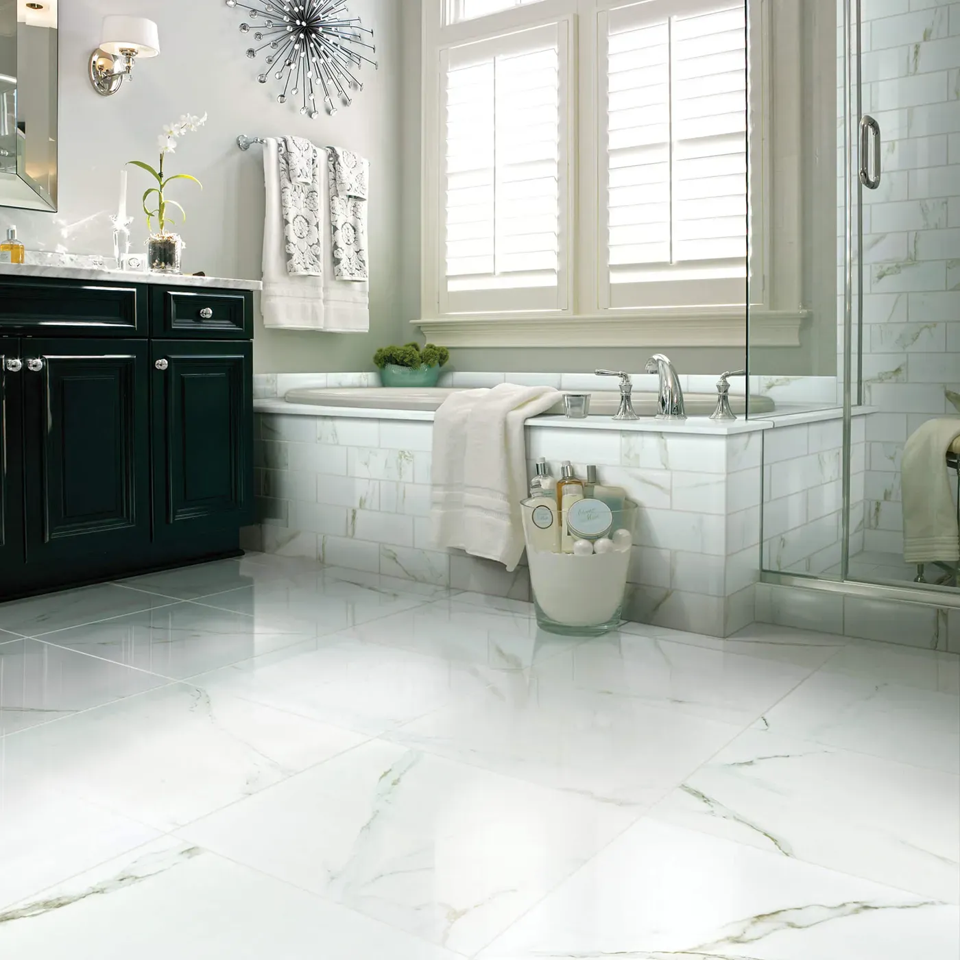 CASINO-POLISHED-CS37V-CASINO4X12-CS35V-CALACATTA-ORO-00121-V Shaw Floors Calacatta Oro polished white marble-look tile in a luxurious bathroom | Ambassador Flooring