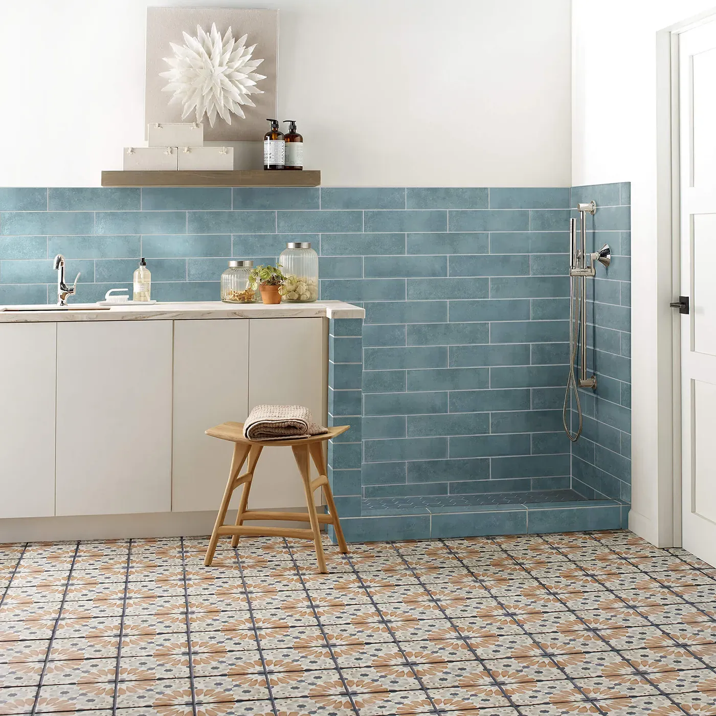 Noble-306TS-00450-Mint-3x12-RM-V Mint blue subway tile on the wall and multi-colored patterned tile on the floor | Ambassador Flooring